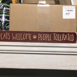 CATS WELCOME , PEOPLE TOLERATED